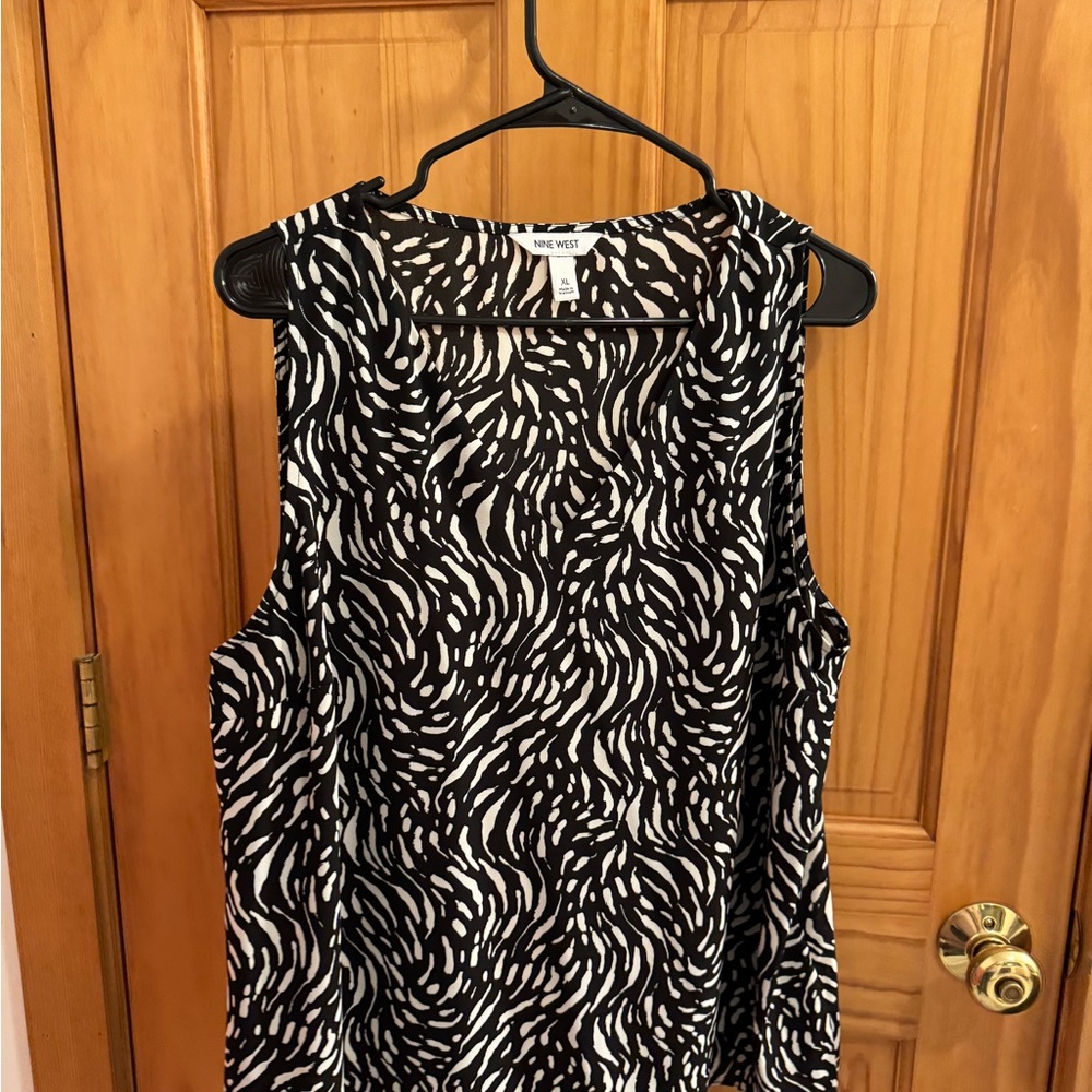 Black and white great to pair with solids for business casual!